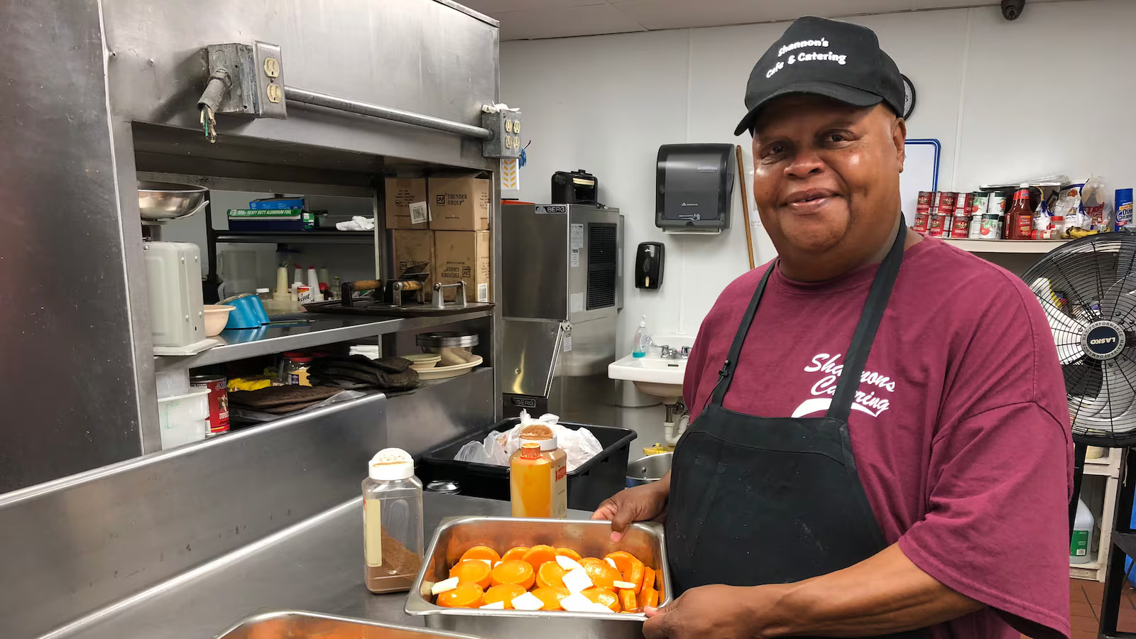 Owner Tommy Durens preparing fresh yams in the Shannon's Cafe kitchen